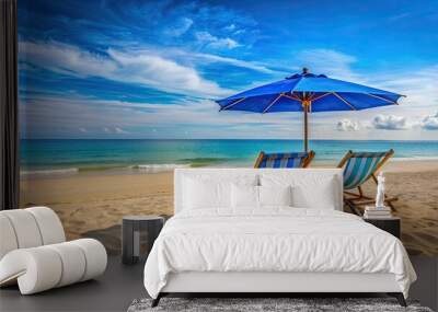 Blue beach chairs and umbrella set up on a sandy beach , vacation, relaxation, summer, seaside, ocean, tropical, relaxation Wall mural