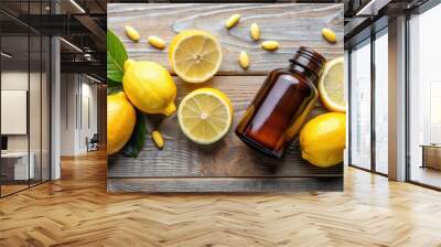 Brown bottle with Vitamin C pills surrounded by fresh lemons , health, supplements, citrus, wellness, medicine, orange Wall mural