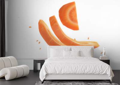 Falling Carrot slice isolated on white background Wall mural