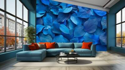 A colorful background made of blue leaves Wall mural