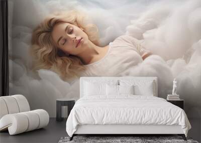 A young, attractive, content blonde woman rests on fluffy clouds in the sky. Dreamy girl with a peaceful slumber Wall mural