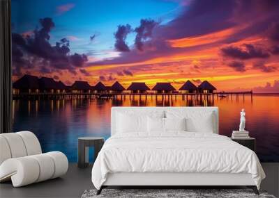 Amazing sunset landscape. Picturesque summer sunset in Maldives. Luxury resort villas seascape with soft led lights under colorful sky. Dream sunset over tropical sea, Generative AI Wall mural