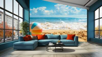 Summer vacation concept: flip-flops, beach ball, and snorkel on the sand. Wall mural