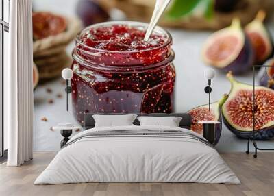 Sweet, delicious fig jam in a jar on a white background Wall mural