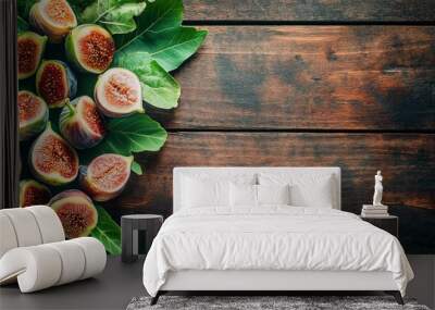 Sweet, fresh organic figs rest beautifully on a wooden table. Their ripe flesh and vibrant leaves make them a healthy and visually appealing vegan treat. Wall mural