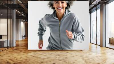 happy person an older woman running in a gray shirt  Wall mural