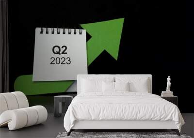 Second quarter of 2023 positive growth performance financial report and fiscal concept. Upward arrow with increasing coins and calendar in black background. Wall mural