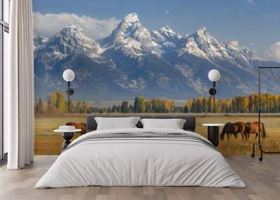 Adult horses (Equus ferus caballus) grazing at the foot  Teton Mountains - generative AI Wall mural