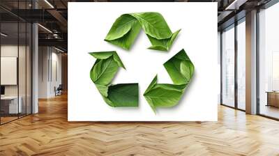 A vibrant green recycling symbol formed from fresh leaves, representing sustainability and eco-friendly practices in nature. Wall mural