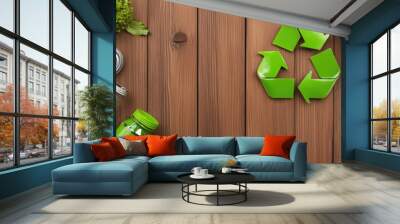 Eco-friendly materials, recycling symbol, and sustainable practices on a wooden surface for environmental awareness. Wall mural