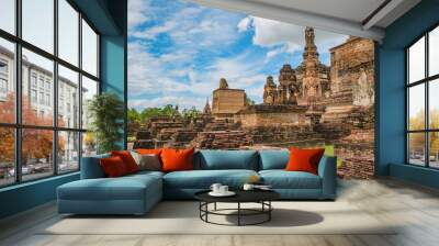 Ruin of Wat mahathat Temple Area At sukhothai historical park,Sukhothai city Thailand Wall mural