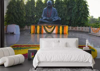 Black stone statue of the Father Of Nation Mahatma Gandhi, who employed nonviolent resistance to lead the successful campaign for India's independence from British rule. 
 Wall mural