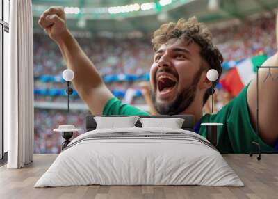 A happy fan at a public event in a stadium, holding an Italian flag with a smile and making a gesture, while enjoying the fun and leisure with a cheering crowd. AIG41 Wall mural