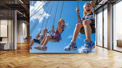 A joyful event of leisure and fun as a group of children travel through the sky on electric blue swings, happily sharing the experience in the clouds. AIG41 Wall mural