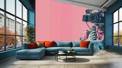 A photo of a person wearing a camera as a mask, with a pink background. AIGZ01 Wall mural