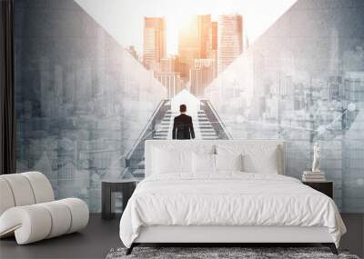 Ambitious business man climbing stairs to meet incoming challenge and business opportunity. The high stair represents the concept of career path success, future planning and business competitions. Wall mural