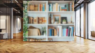 Blur background of book shelf in library space filled with books and green plants, enhancing a serene reading environment. Personal study and relaxation concept. Interior design concept. Spate. Wall mural