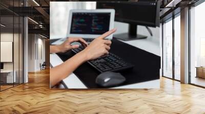 Cropped hands image of IT developer creating with typing information on pc with coding program information data website application, wearing jeans shirt surround safety analysis two screen. Stratagem. Wall mural