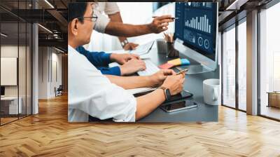 Data analysts team working analyzing business intelligence BI dashboard display on laptop to analyze financial, trend, and marketing data. BI technology and data analysis for business success. Prudent Wall mural