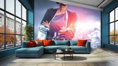 Double Exposure Image of Business Person on modern city background. Future business and communication technology concept. Surreal futuristic cityscape and abstract multiple exposure graphic interface. Wall mural