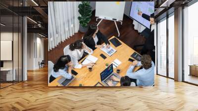 Project manager planning schedules for business task at meeting room, Gantt chart software show on TV screen. Multi ethnic diversity business people and modern business project management. Meticulous Wall mural