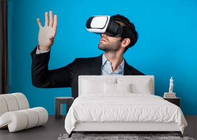 Smart business man with suit holding something while VR goggle to connect metaverse. Professional project manager looking at hologram by using visual reality headset. Technology innovation. Deviation. Wall mural