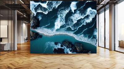 Spectacular drone photo, top view of seascape ocean wave crashing rocky cliff with sunset at the horizon as background. Beautiful coastal scenic landscape with turquoise water beating rocky boulder. Wall mural