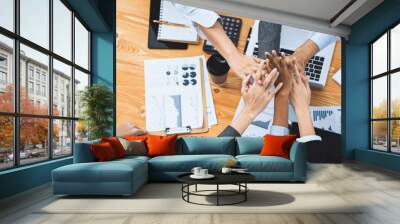 Top view diverse business team celebrate successful meeting with high-fives and expressions of happiness in corporate office meeting represent unity success and professional integrity. Concord Wall mural