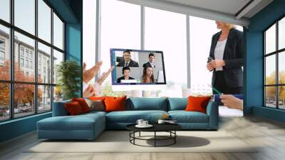 Video call group business people meeting on virtual workplace or remote office. Telework conference call using smart video technology to communicate colleague in professional corporate business. Wall mural