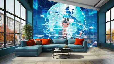 Woman looking around analyzed world finance data through VR glasses uploading turn around global interface digital infographic network technology virtual 3D reality animation at server. Contraption. Wall mural