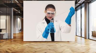 young woman scientist working in chemical laboratory and examining biochemistry lab sample. science  Wall mural