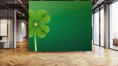 Close-up of a four leaf clover on a gradient green background. Wall mural