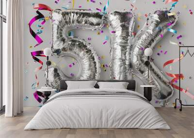 5k silver foil party balloons with colorful party streamers. Minimal social media followers concept. Flat lay celebration Wall mural