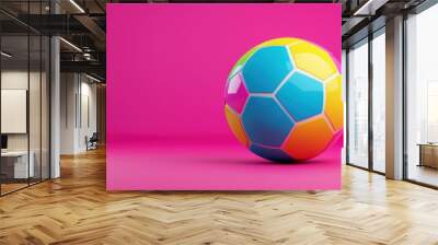 Colorful soccer ball on a vibrant pink background Wall mural