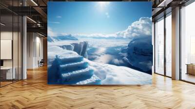 Steps leading to a breathtaking view of a frozen landscape with a bright blue sky and fluffy clouds. Wall mural