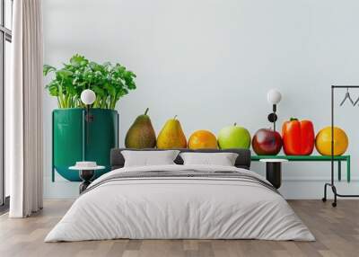 Elegant minimalist banner featuring fresh organic fruits and vegetables in rainbow colors arranged in a row with a modern green plant stand.  Wall mural