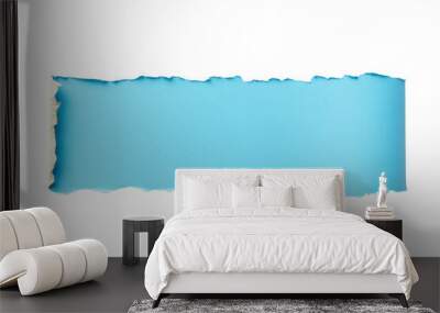 An artistic piece of torn sky blue paper with a rustic edge, ideal for backgrounds or creative design projects. Wall mural