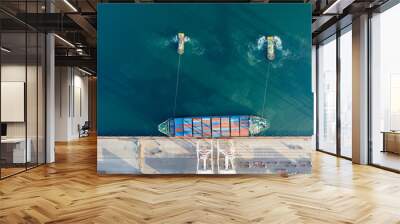 Aerial view. Container ship in pier with crane bridge carries out export and import business in the open sea. Logistics and transportation Wall mural