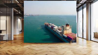 Aerial view. Container ship in pier with crane bridge carries out export and import business in the open sea. Logistics and transportation Wall mural