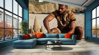 Summer beach photography of a handsome African American male fashion model in African attire Wall mural