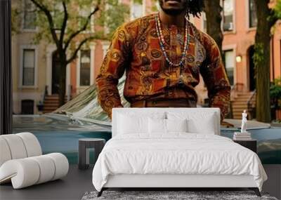 summer city street photography of a confident African American male fashion model in African attire Wall mural