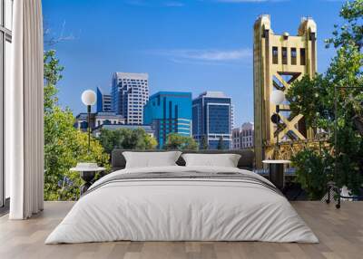 View towards the Tower Bridge and the skyscrapers in downtown Sacramento on a sunny day; California Wall mural