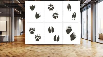 Traces of animals vector illustration. Animals footprints Wall mural