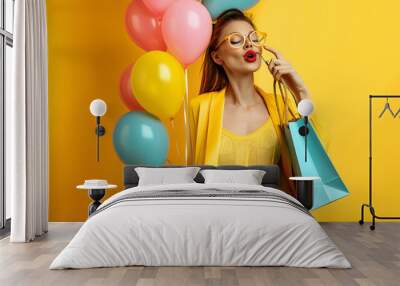 Female celebrating Birthday on yellow background Wall mural