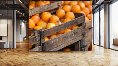 Stacked Wooden Crates Filled with Fresh Oranges Wall mural