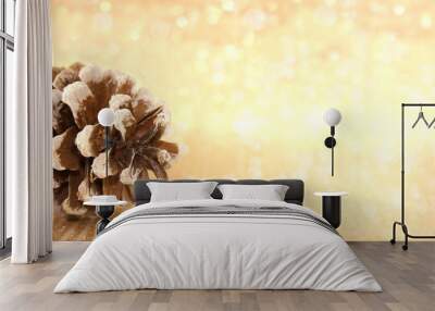 Pinecone on golden shiny background with copy space for text. Ho Wall mural