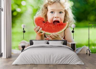 Child having picnic in park Wall mural