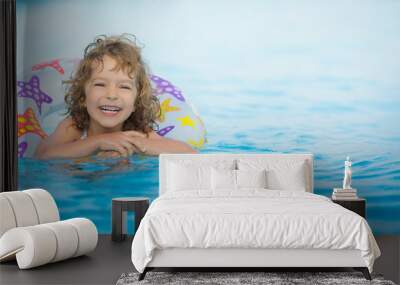 Child in swimming pool Wall mural