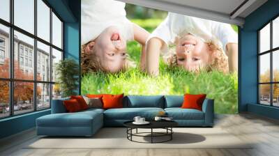 Child standing upside down Wall mural