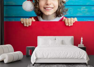 Funny child holding cardboard banner blank Wall mural